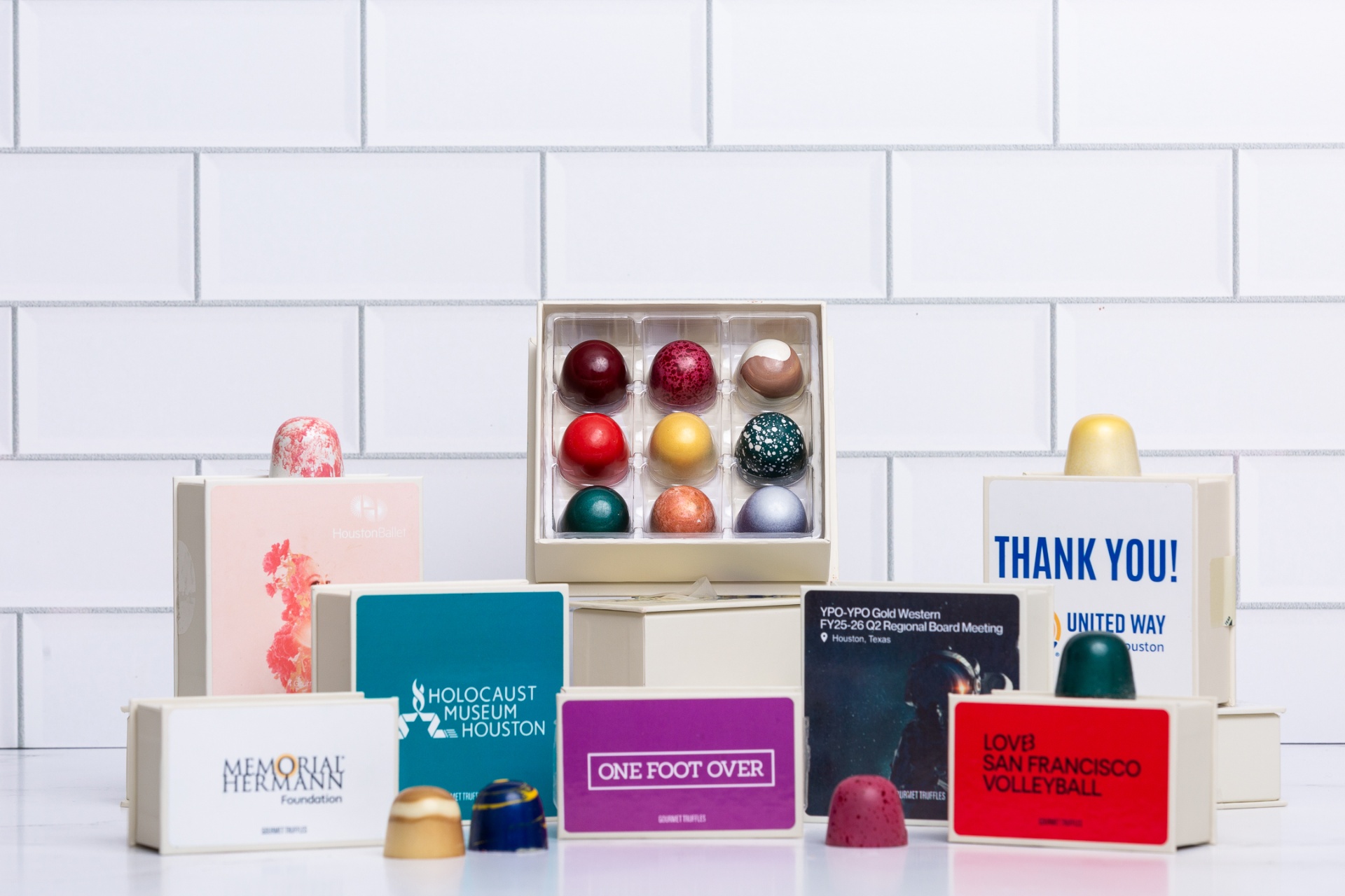 Winfield's gift boxes with custom-branded sleeves for Houston Ballet, Memorial Hermann, United Way, and more